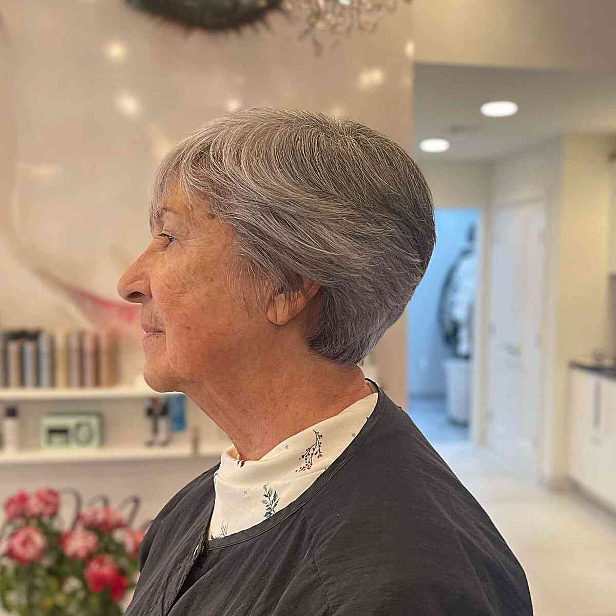 Very Short Grey Feathery Stacked Pixie on Grey-haired Women over 60