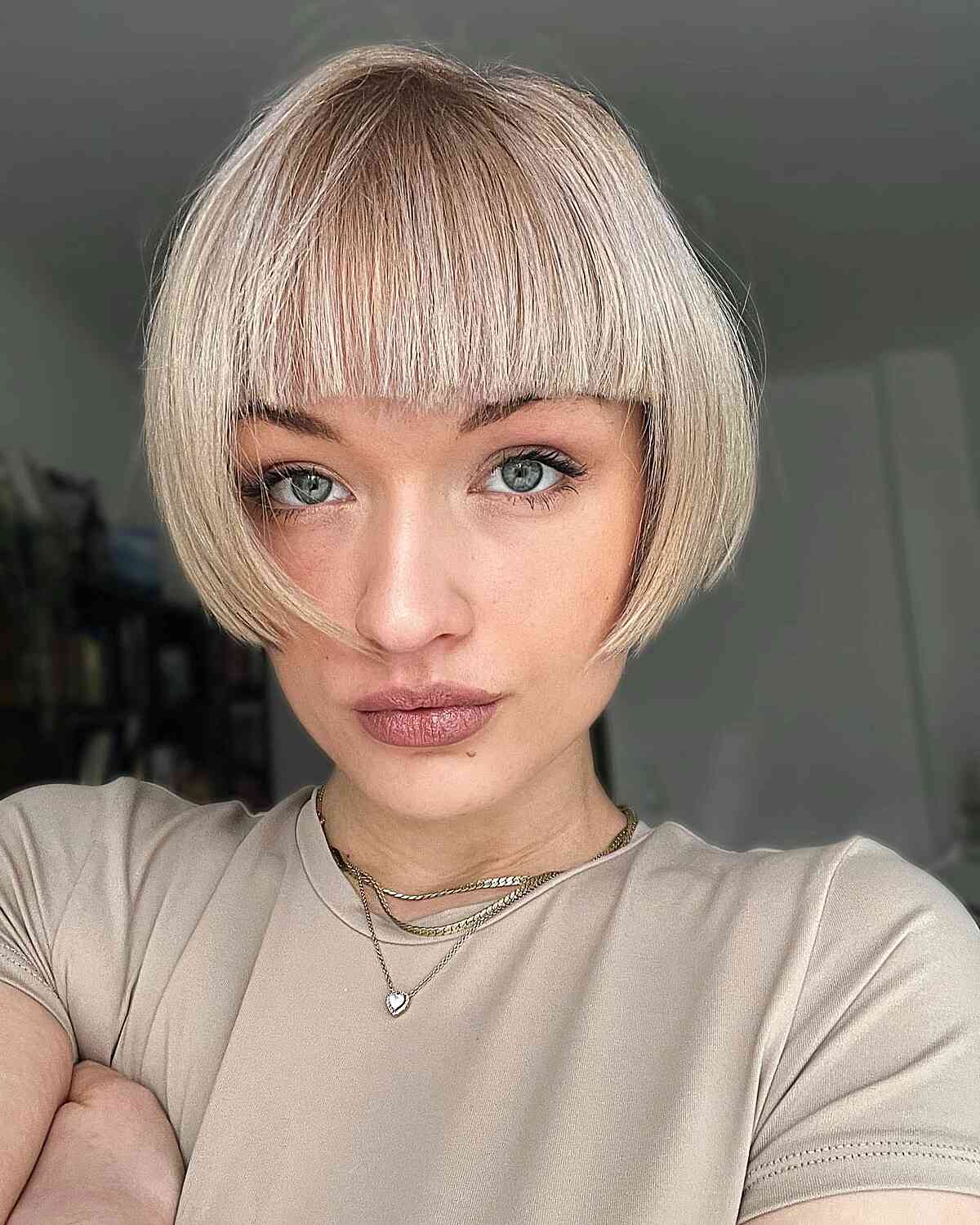 very short hair with full bangs and chopped layers
