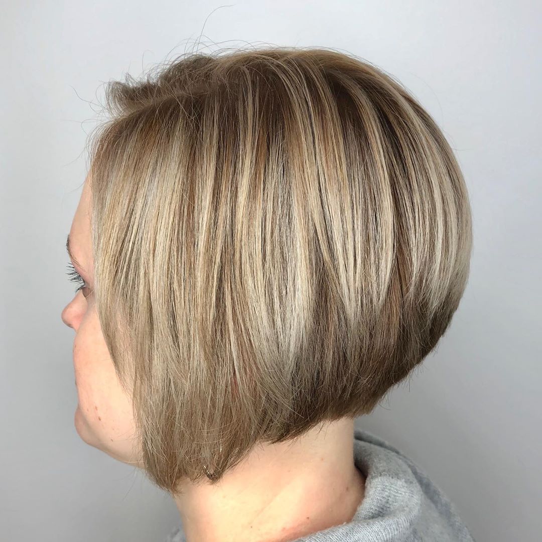 Very Short Layered Inverted Bob with a Blonde Balayage