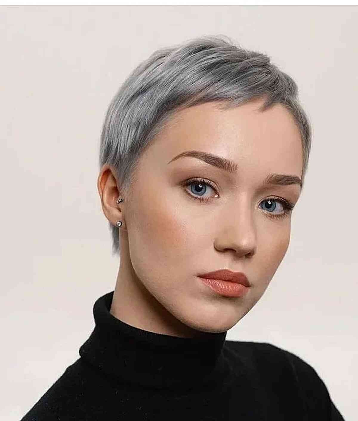 Very Short Side-Swept Pixie with Grey Balayage and for women with an oval face