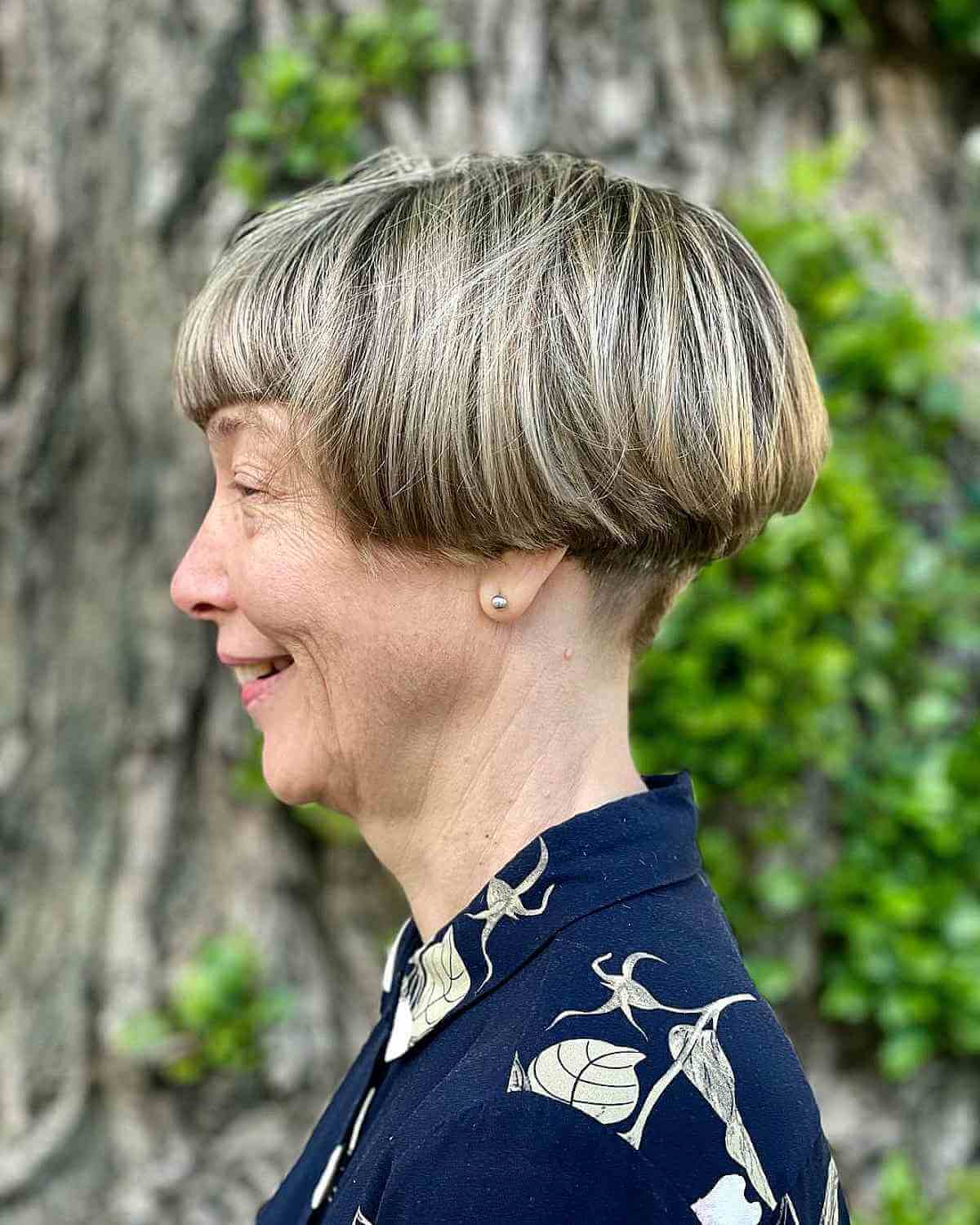 Very Short Undercut Wedge Bob with Blunt Bangs for 70-Year-Olds