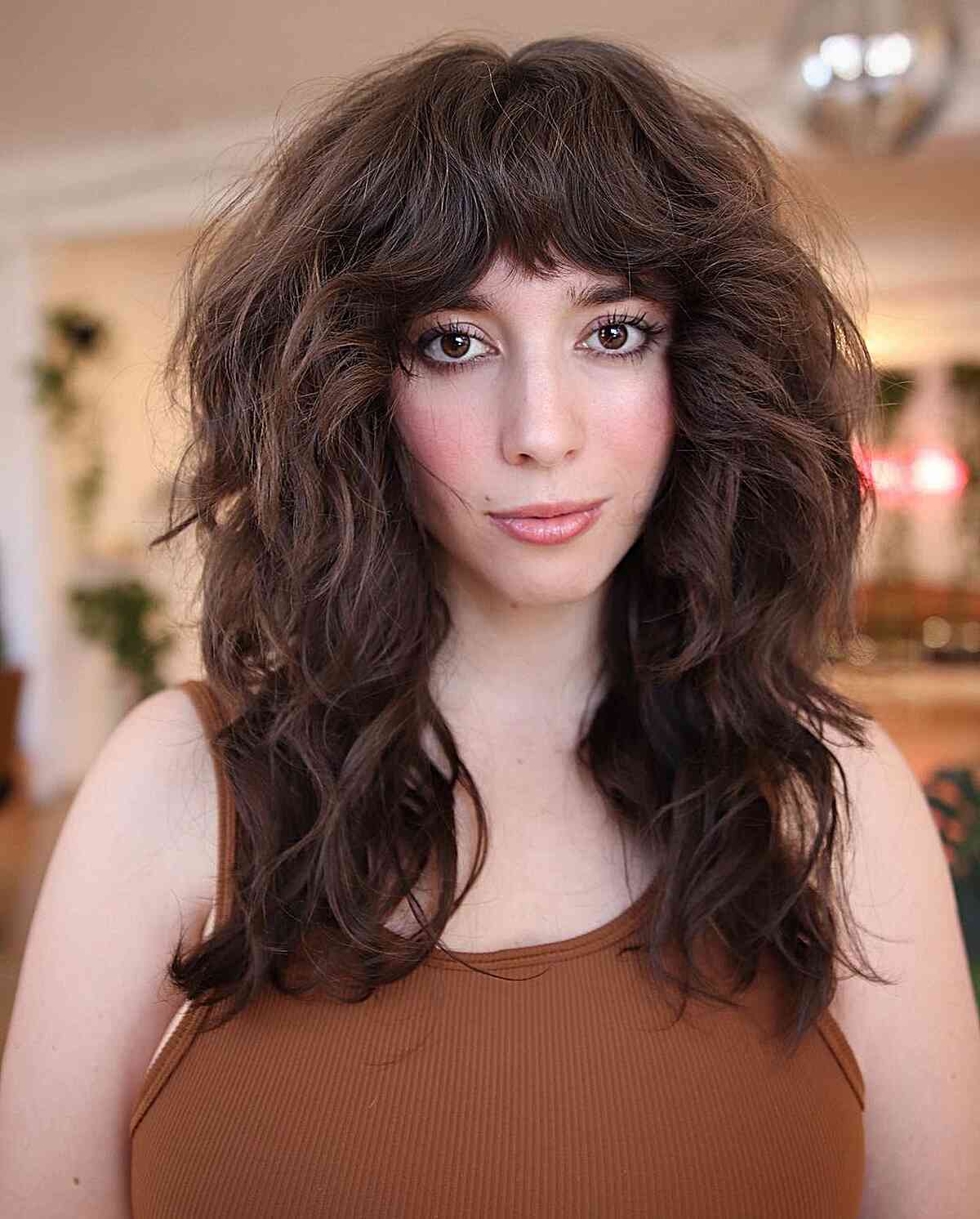Very Thick Shag with Bangs on Medium-Length hair and choppy ends