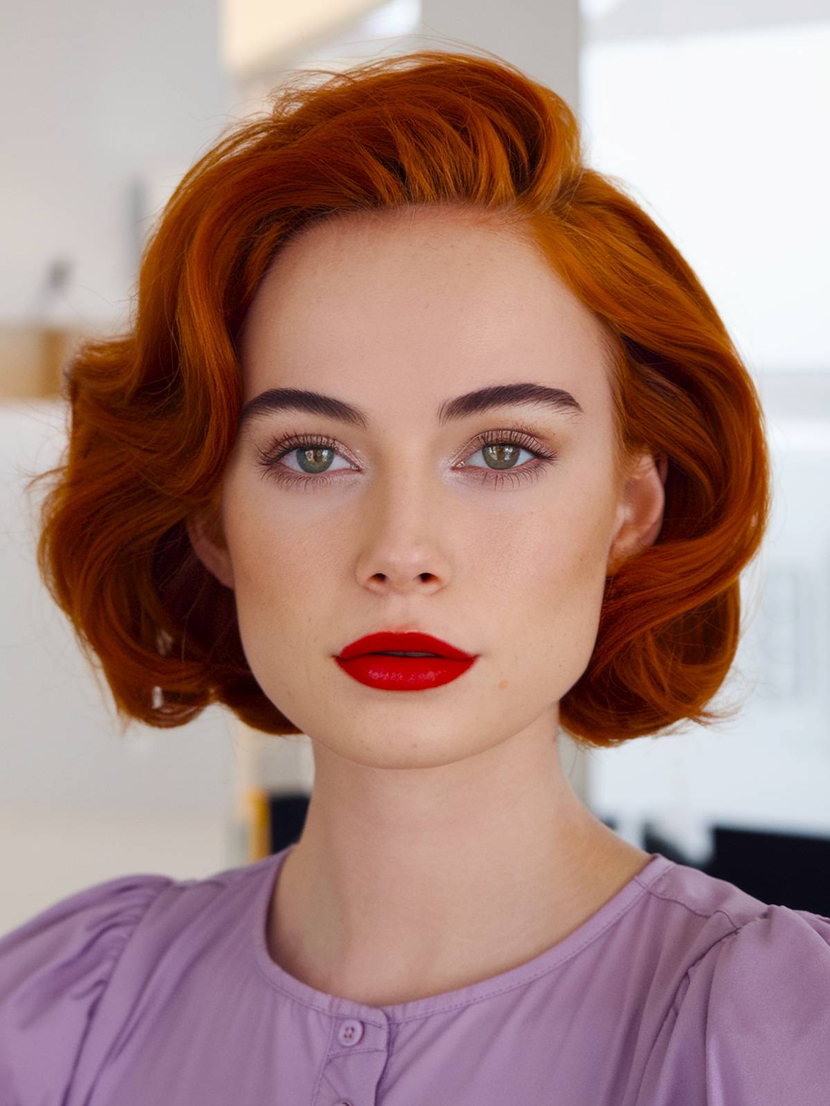 90s layered ginger bob with bold color