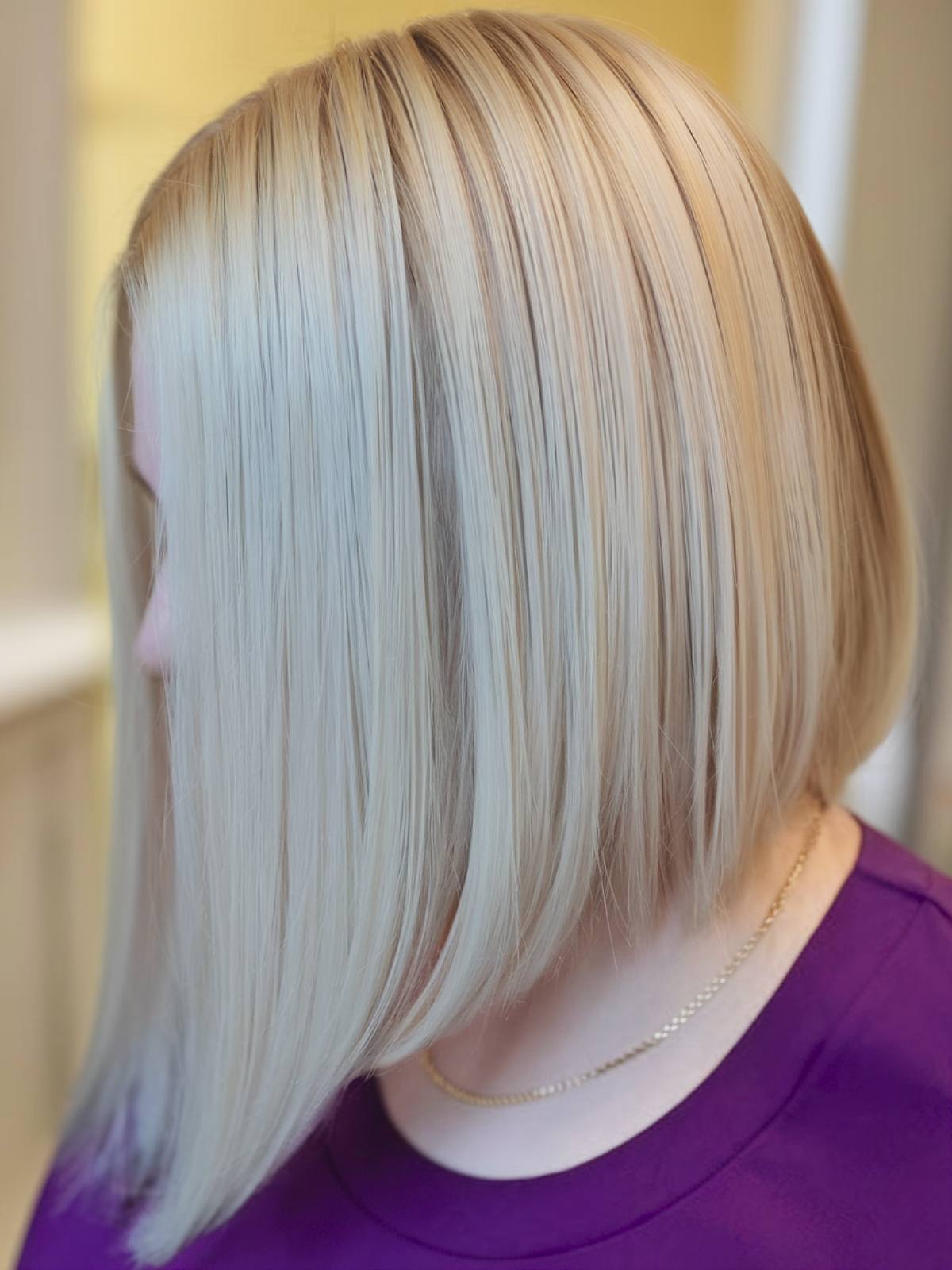 Blonde angled bob haircut with pale tones