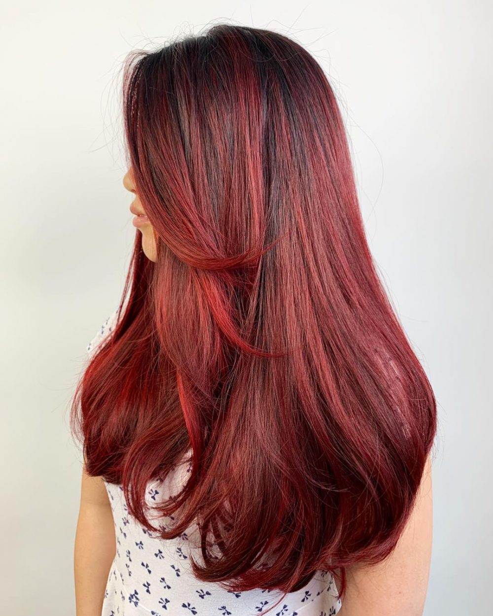 Vibrant Long Red Hair with Long Side Bangs