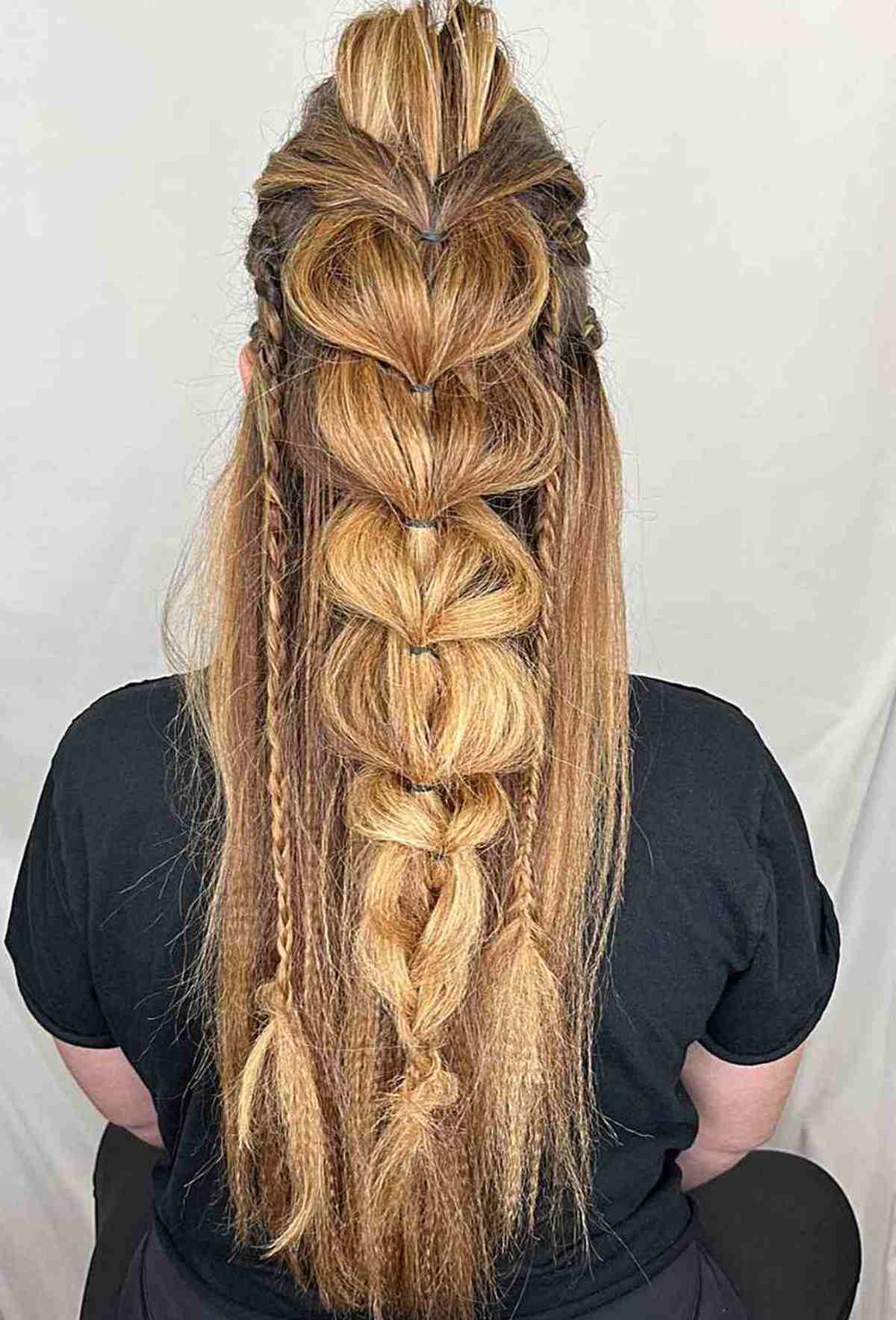Viking-Inspired Long Crimped Hair with Central Braid Style