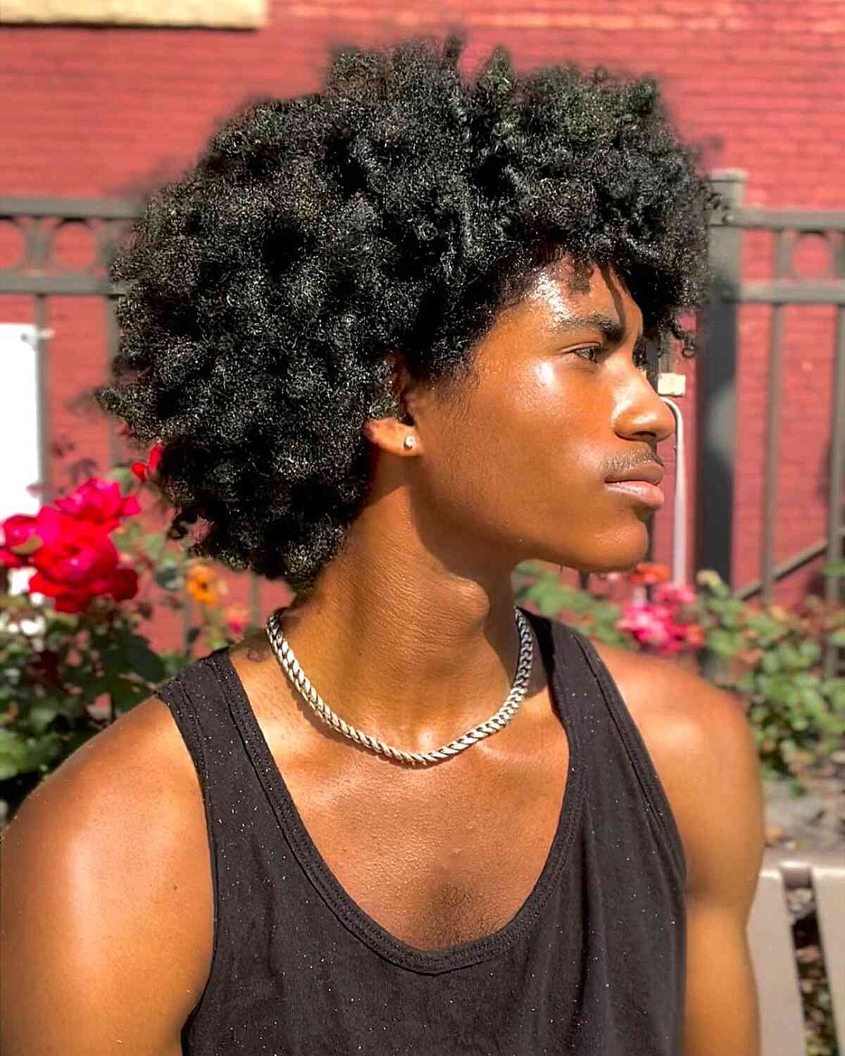 Voluminous afro for black men with kinky hair texture
