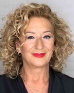 Curls That Wow: 27 Hairdos for Women Over 60 with Curly Hair