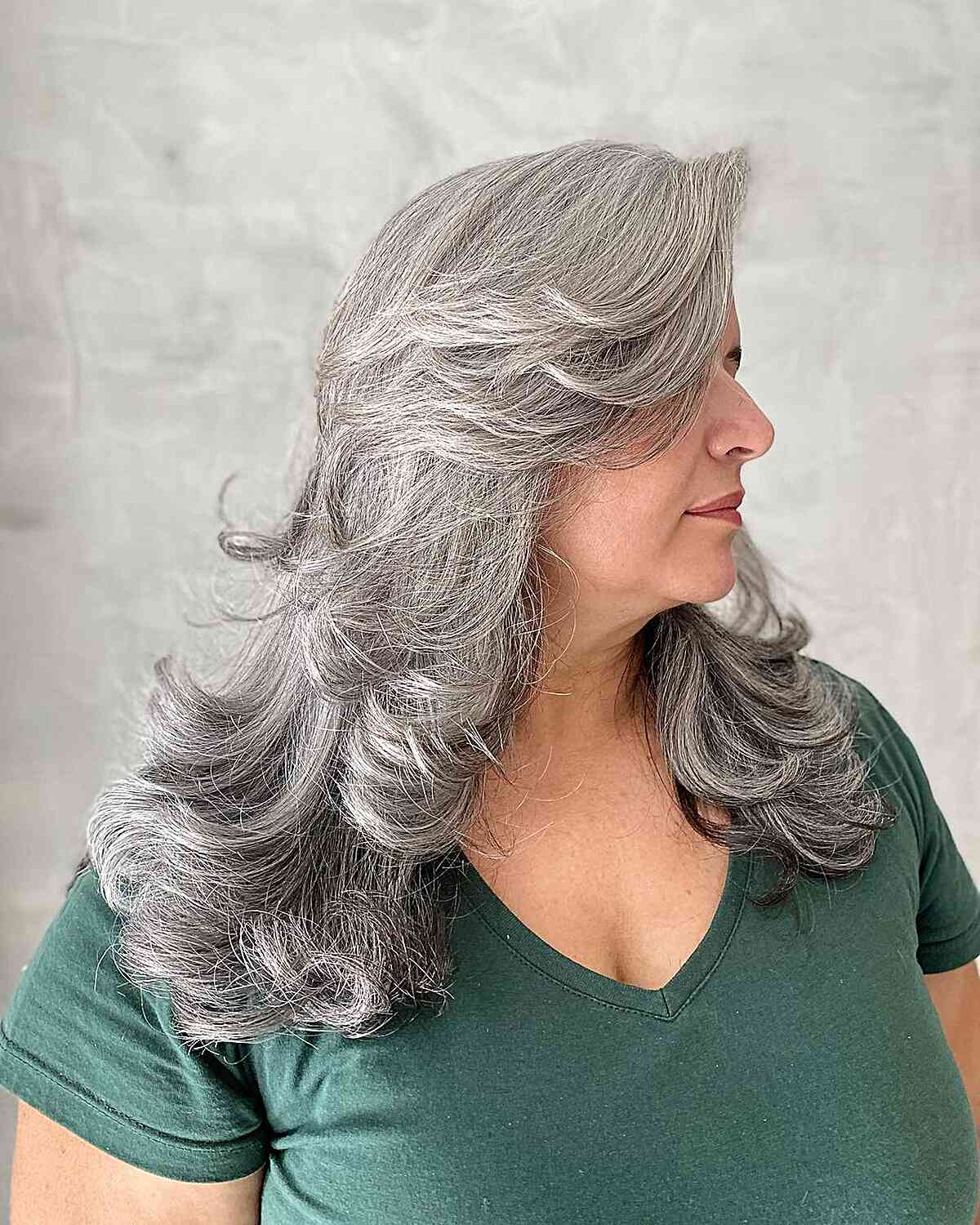 Voluminous Butterfly Layered Cut for Overweight Long-Haired 50-Year-Old Women with Grey Hair
