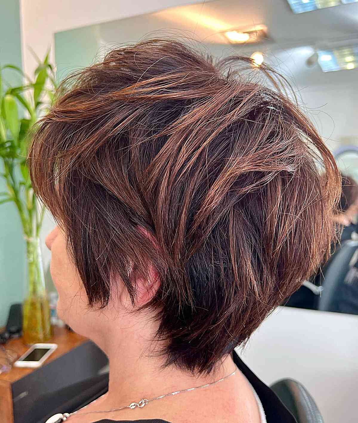 Voluminous Choppy Pixie Bob with Brown Balayage for Women over sixty