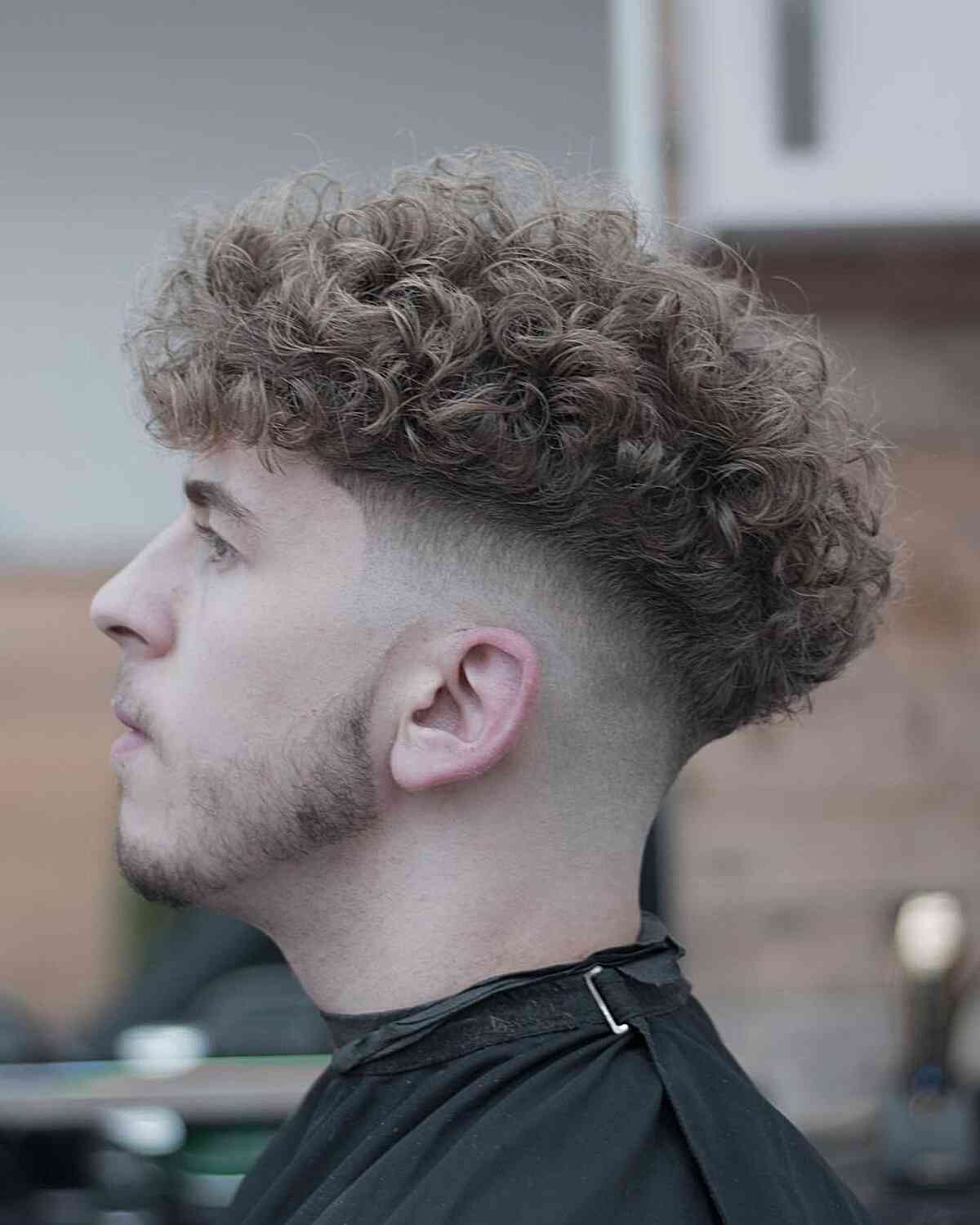 Voluminous Curls with a Fade Cut for Men