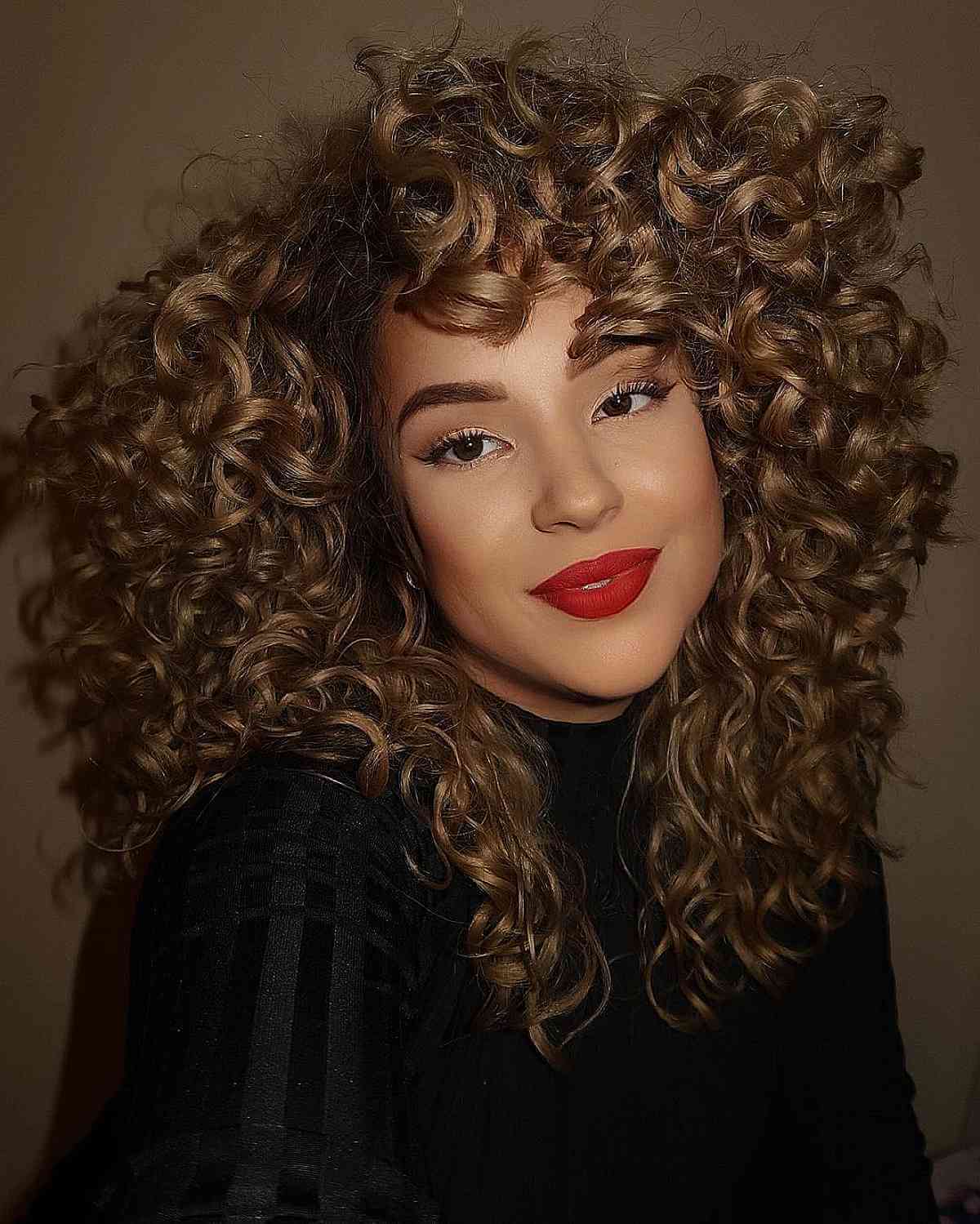 Voluminous Curls with Bangs