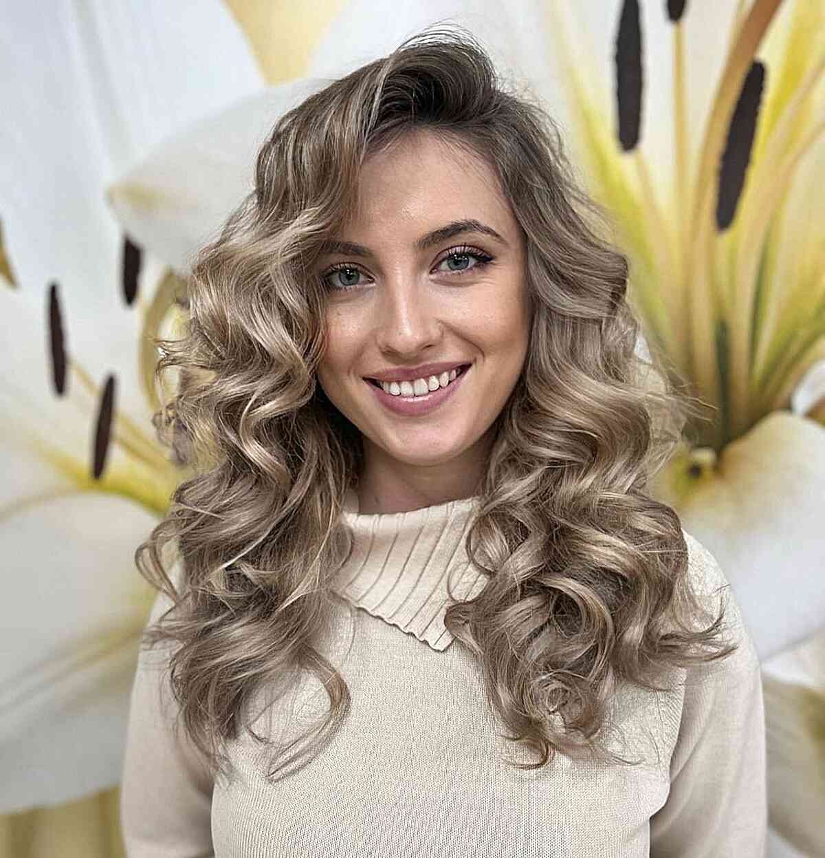 Voluminous Mid-Length Hairstyle with a Deep Side Part and curled ends for thick hair