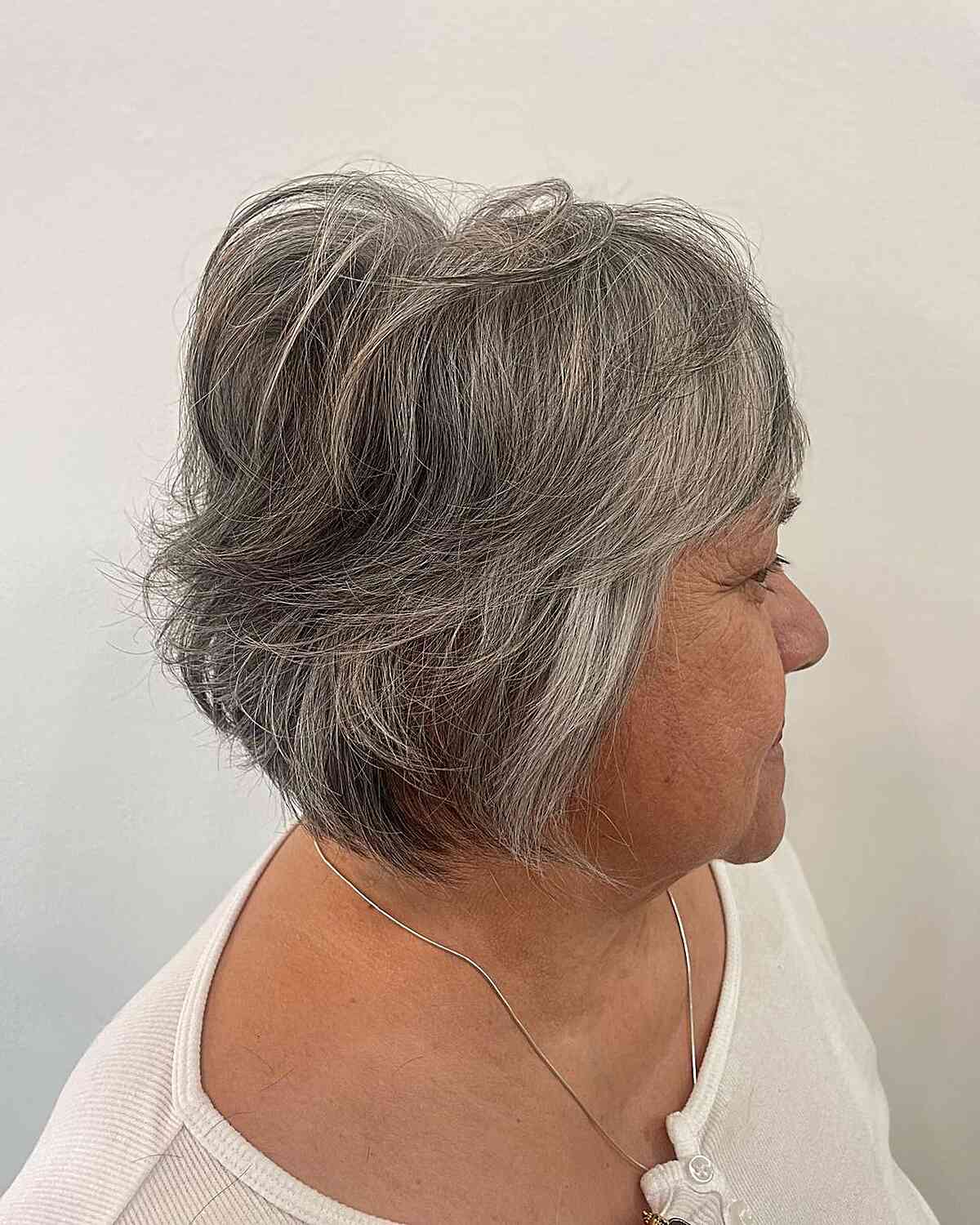 Voluminous Short Bobbed Hair with Bangs and Shorter Layers for Ladies Over 70