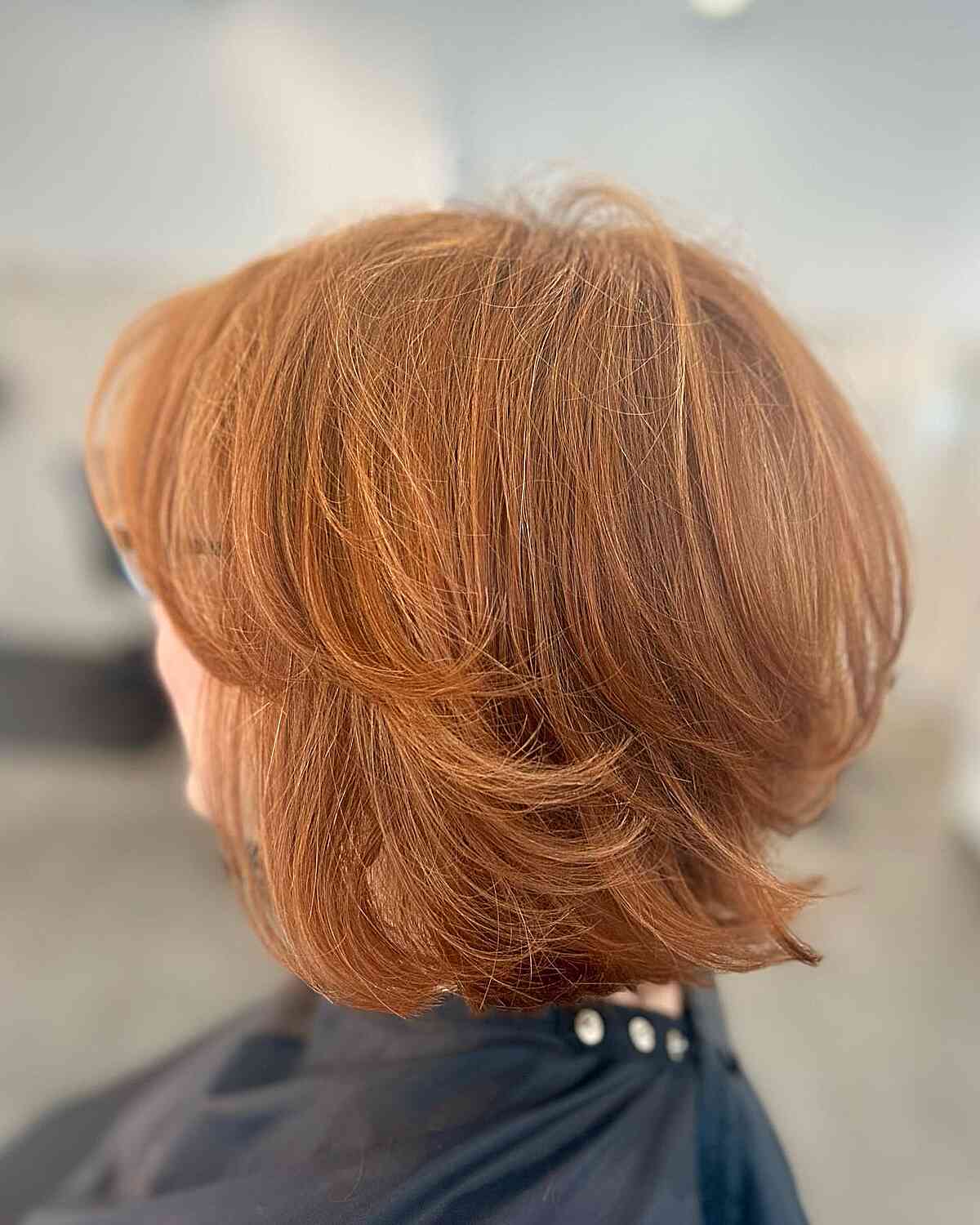 Voluminous Short Ginger Bob with Butterfly Layers