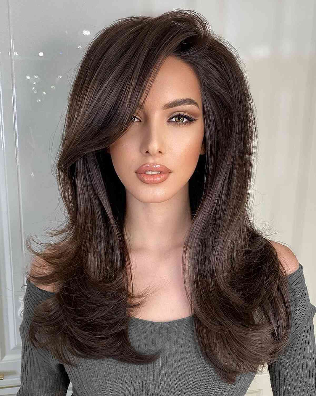 Voluminous Thick Brown Hair with a Side Part