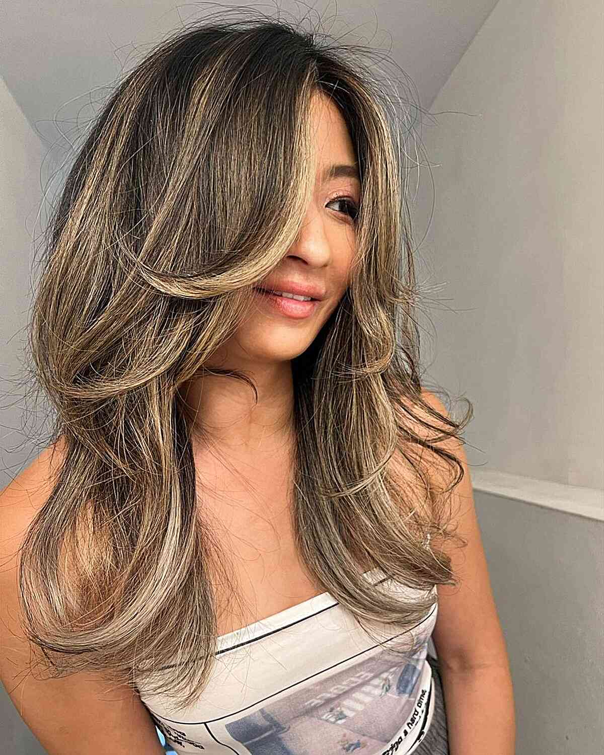 Warm Beige Blonde Highlights and Money Piece for Long Layered Hair