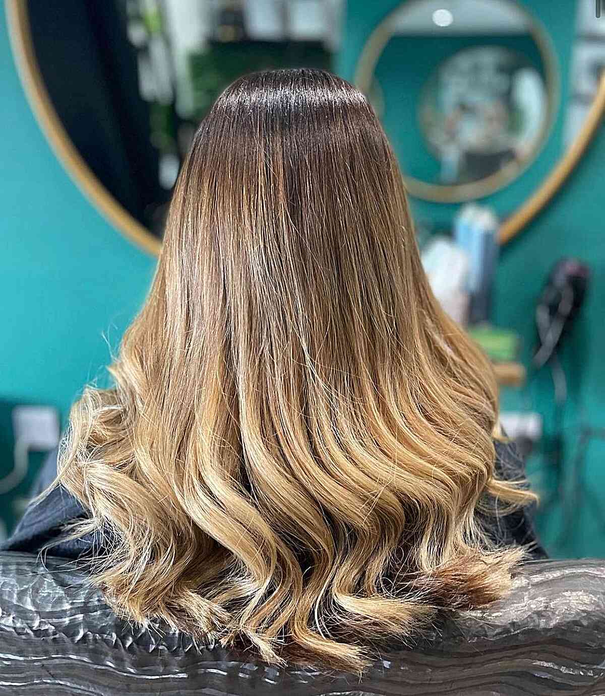 Medium-Long Wavy Warm Blonde Ombre Balayage with Dark Roots