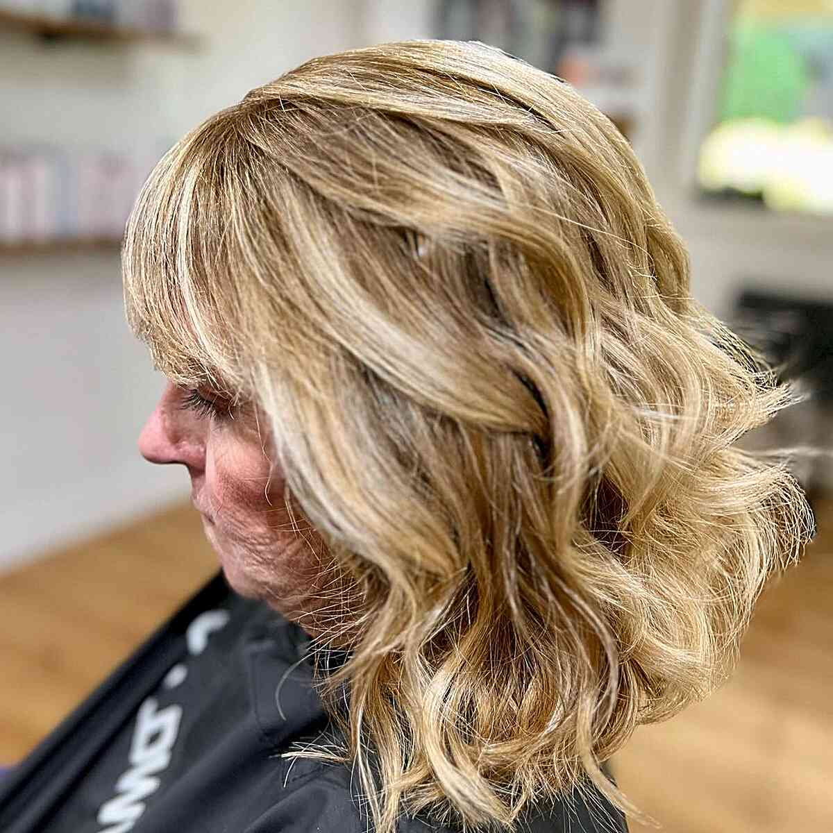 Warm Blonde Wavy Lob with Bangs for Women Over 60