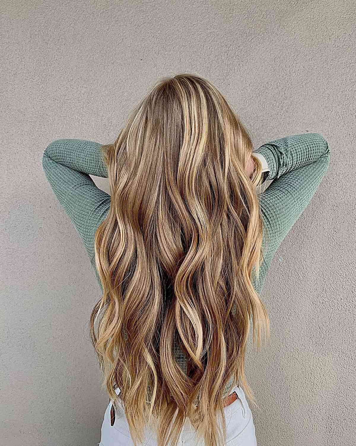 Warm Dimensional Bronde Balayage Hair with Long Waves and Layers