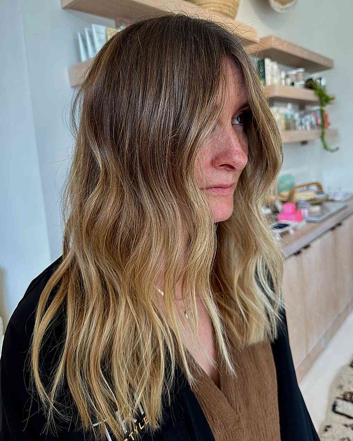 Medium Warm Brown to Blonde Ombre Balayage Hair Styled with Soft Waves