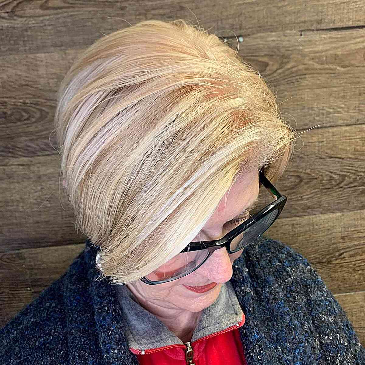 Deep Side-Parted Short Hair with Warm Buttery Blonde Highlights on Older Ladies Over 60