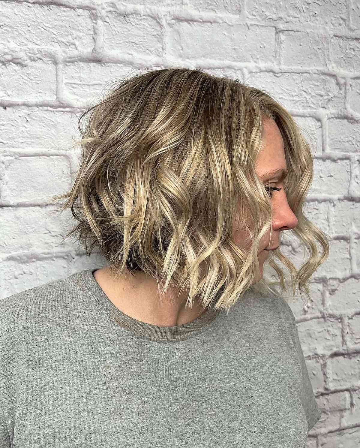 Wavy A-Line Lob Cut with Choppy Ends That is Above the Shoulders