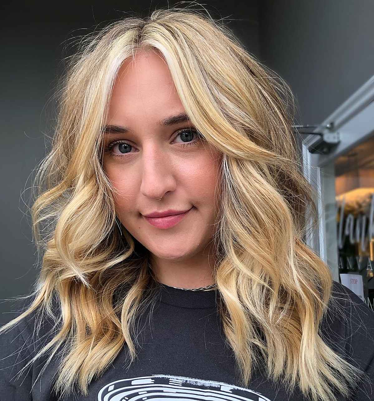 Wavy Blonde Shag with a Center Part