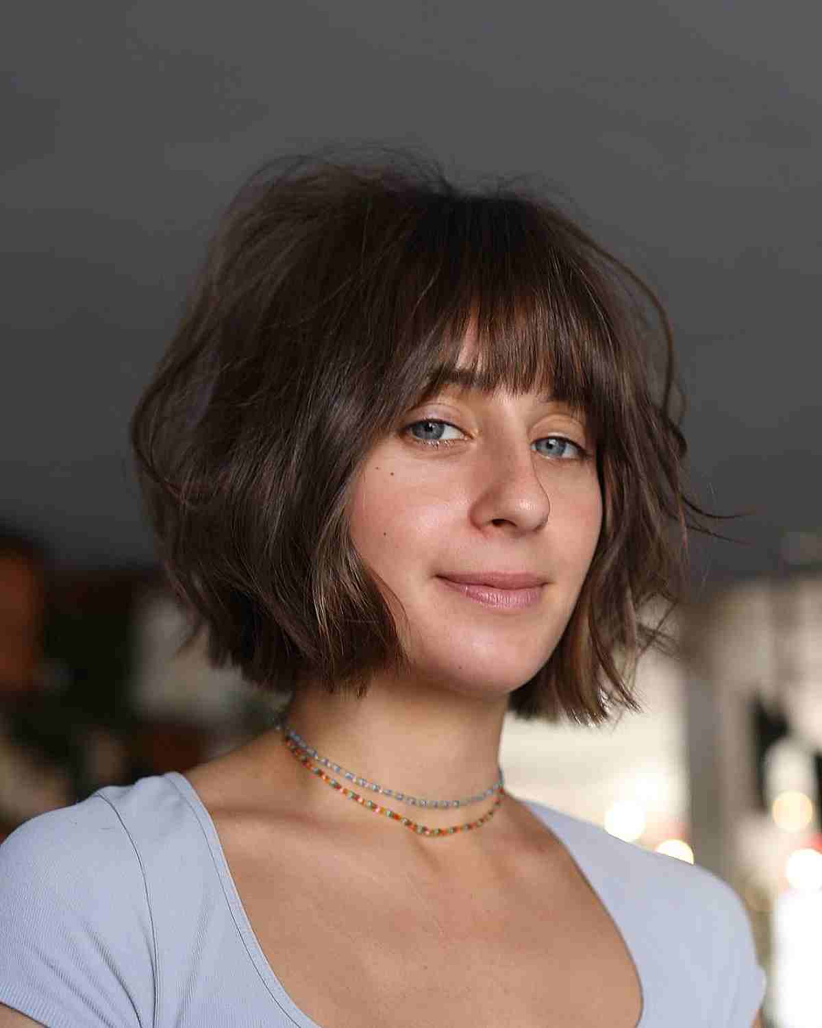 Wavy Blunt Bob with Light Bangs for Thin Hair