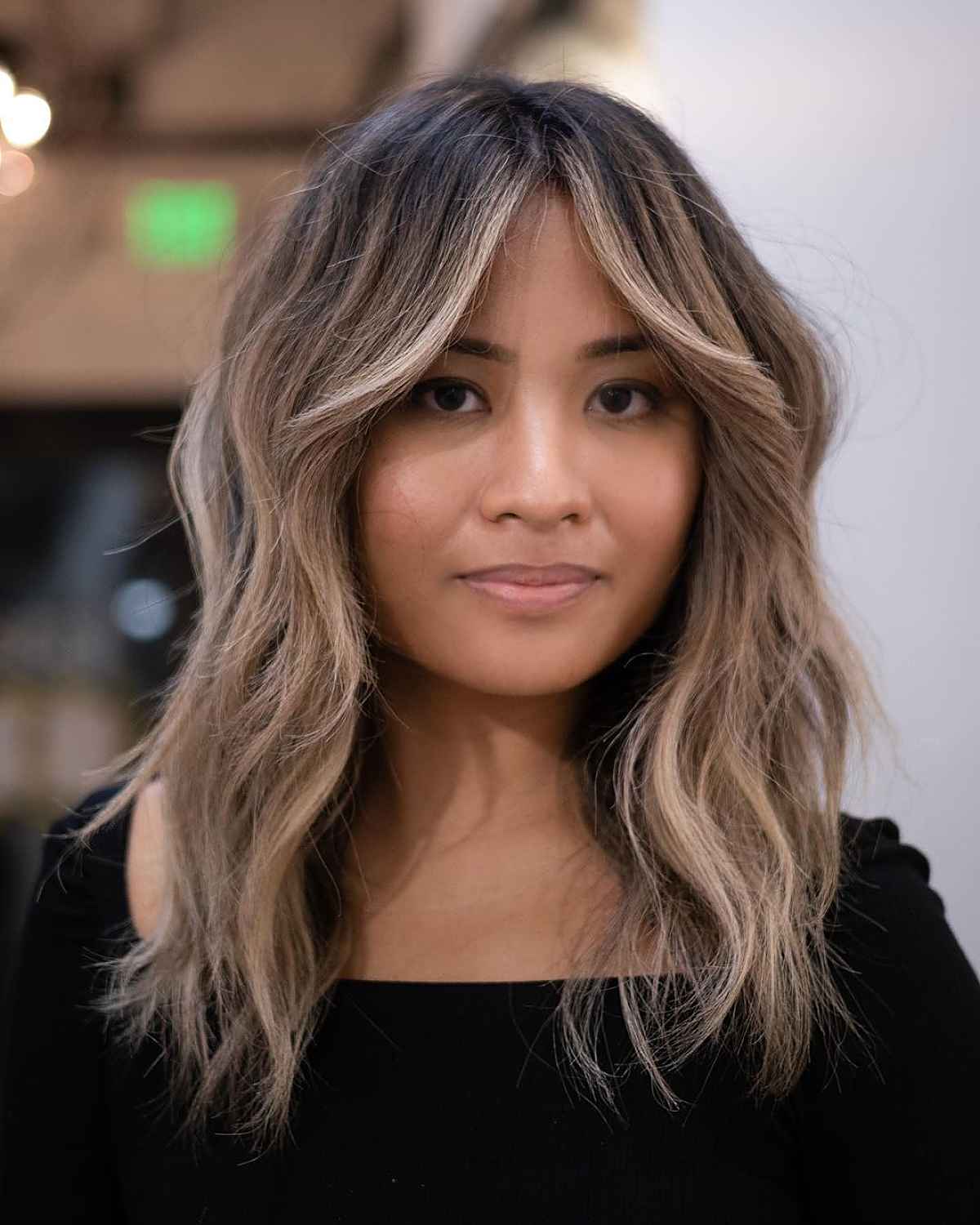 Wavy Hair with Curtain Bangs and Money Pieces