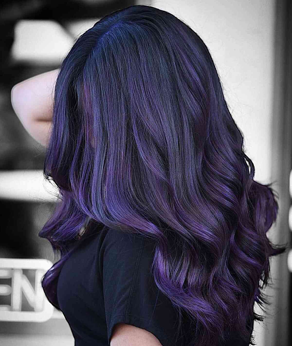 Medium-Length Wavy Hair with Midnight Violet Tone