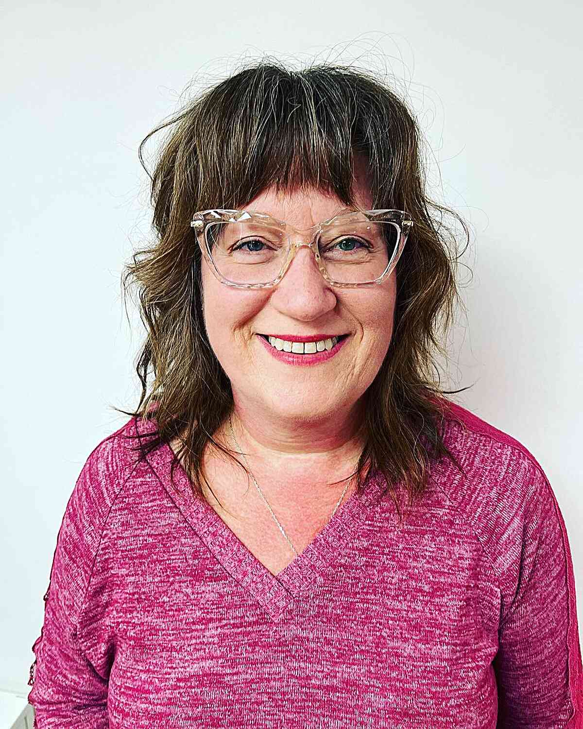 Wavy Mid-Length Shag with Heavy Bangs for Women Over 60