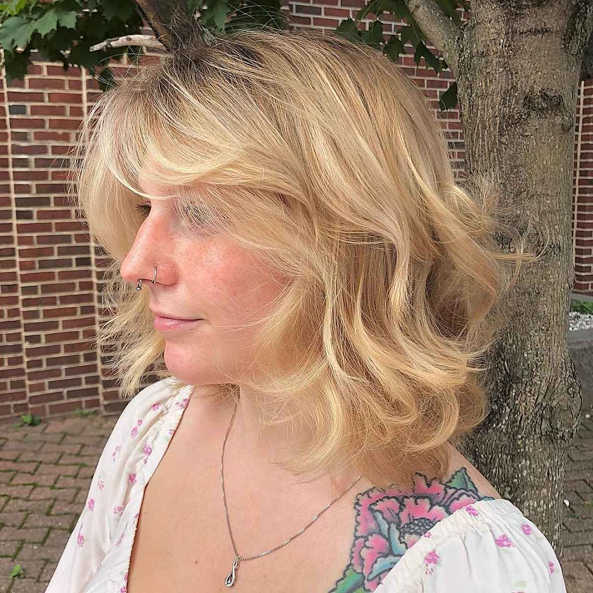 Wavy Shoulder-Length Shaggy Hair with Swoop Bangs