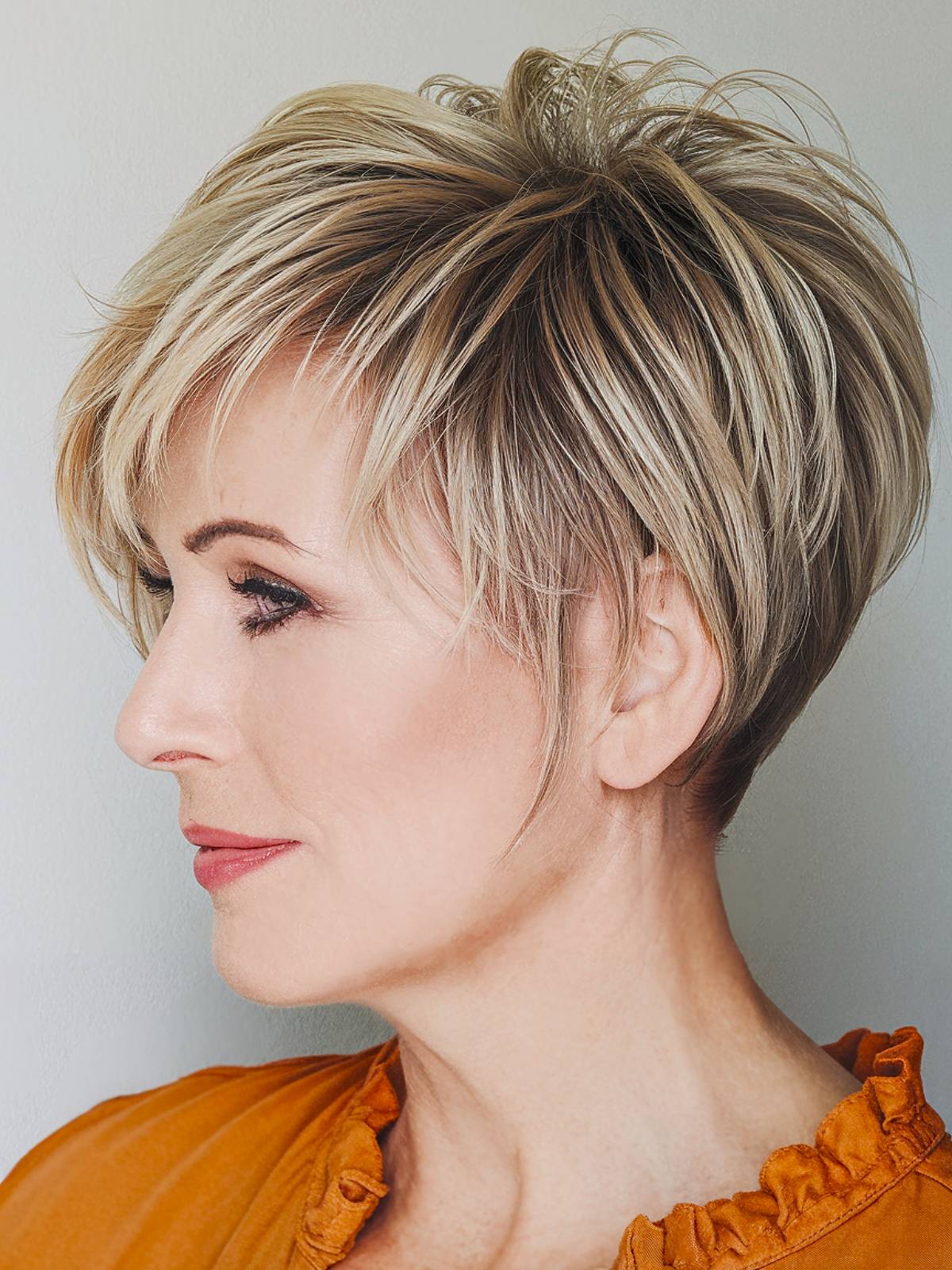 Wedge pixie haircut over 50 older women