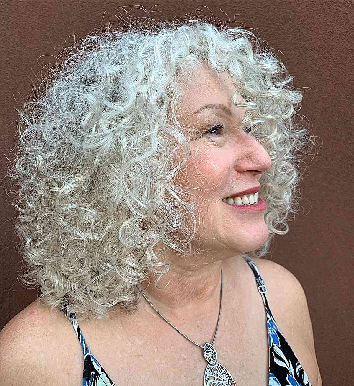 White Rezo Cut Curls for 50-Year-Olds with Round Faces and shoulder-length hair