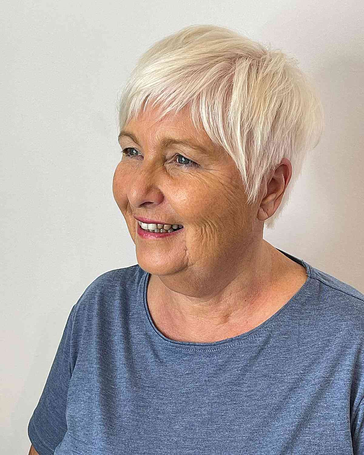 White Sassy Pixie with Light Bangs on Fine-Haired Women Over 50