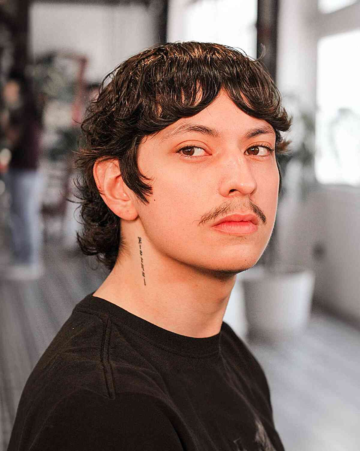 Winged Choppy Mullet with Curtain Bangs for Modern Men