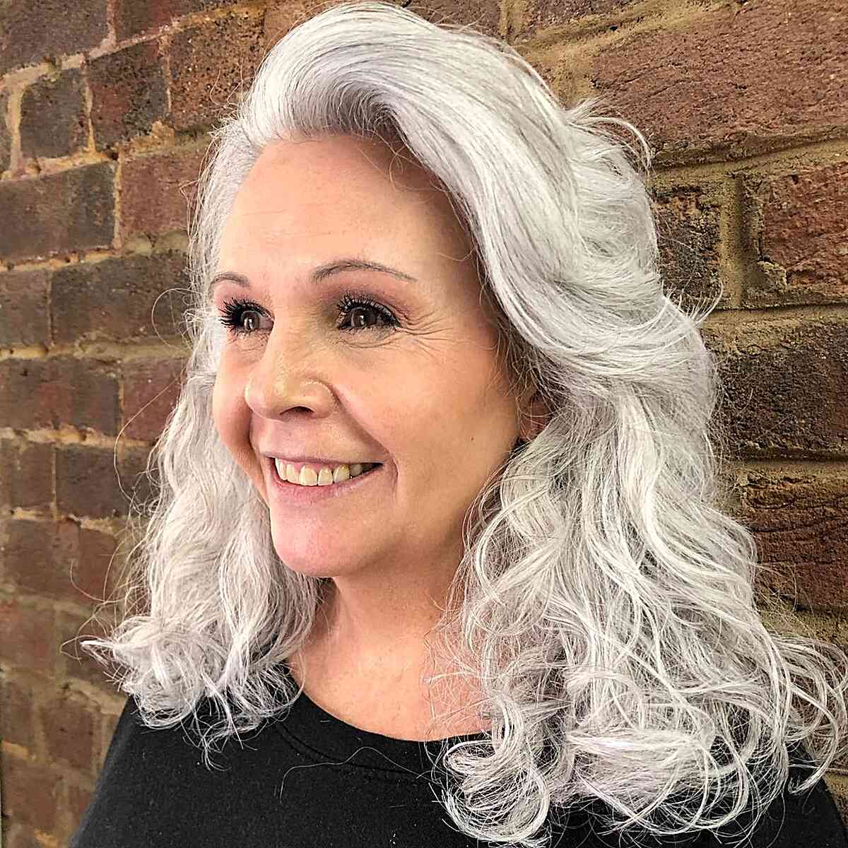 Wispy Silver Curls on mid-length hair
