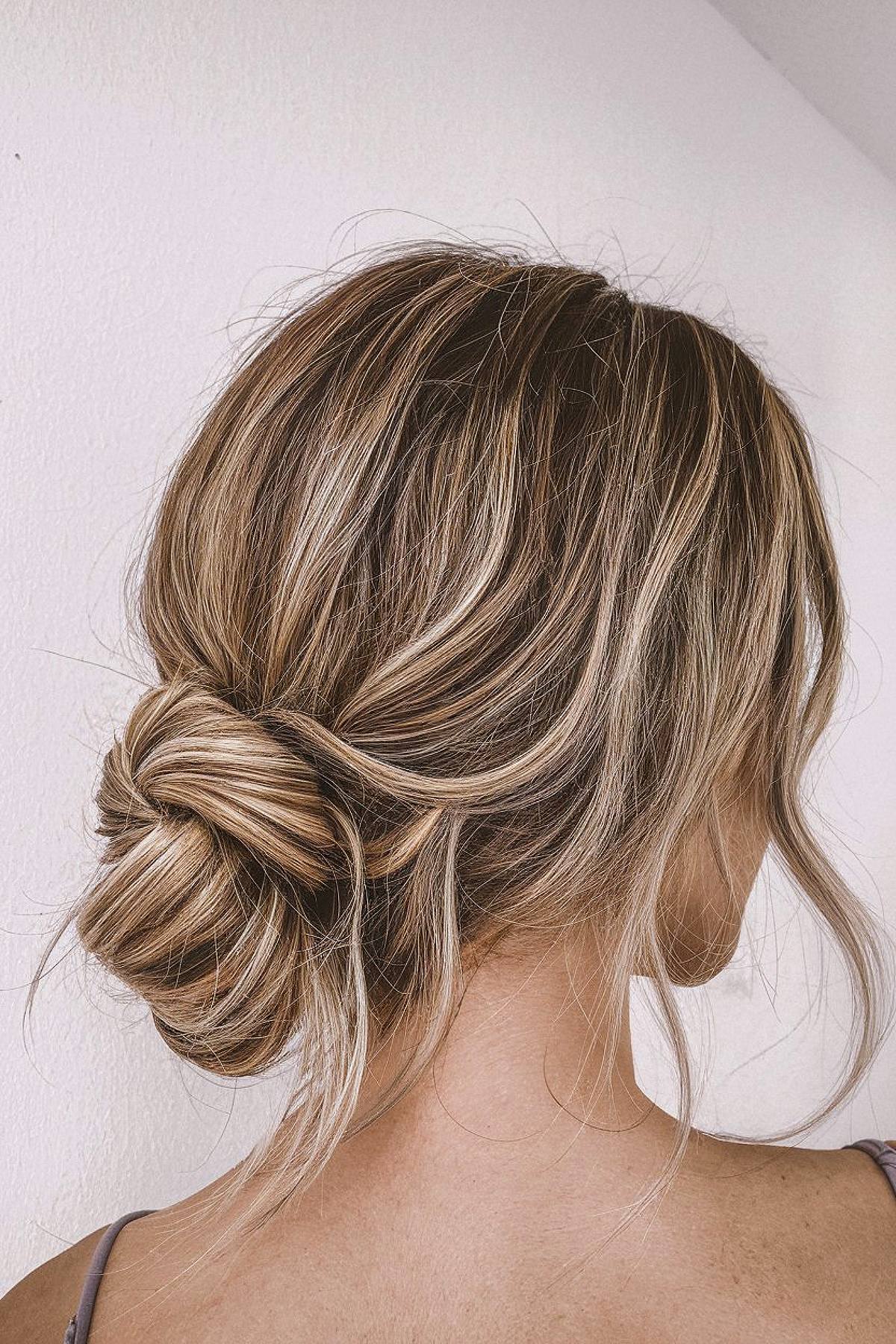 Work-from-home hairstyle for long hair with a loose low bun