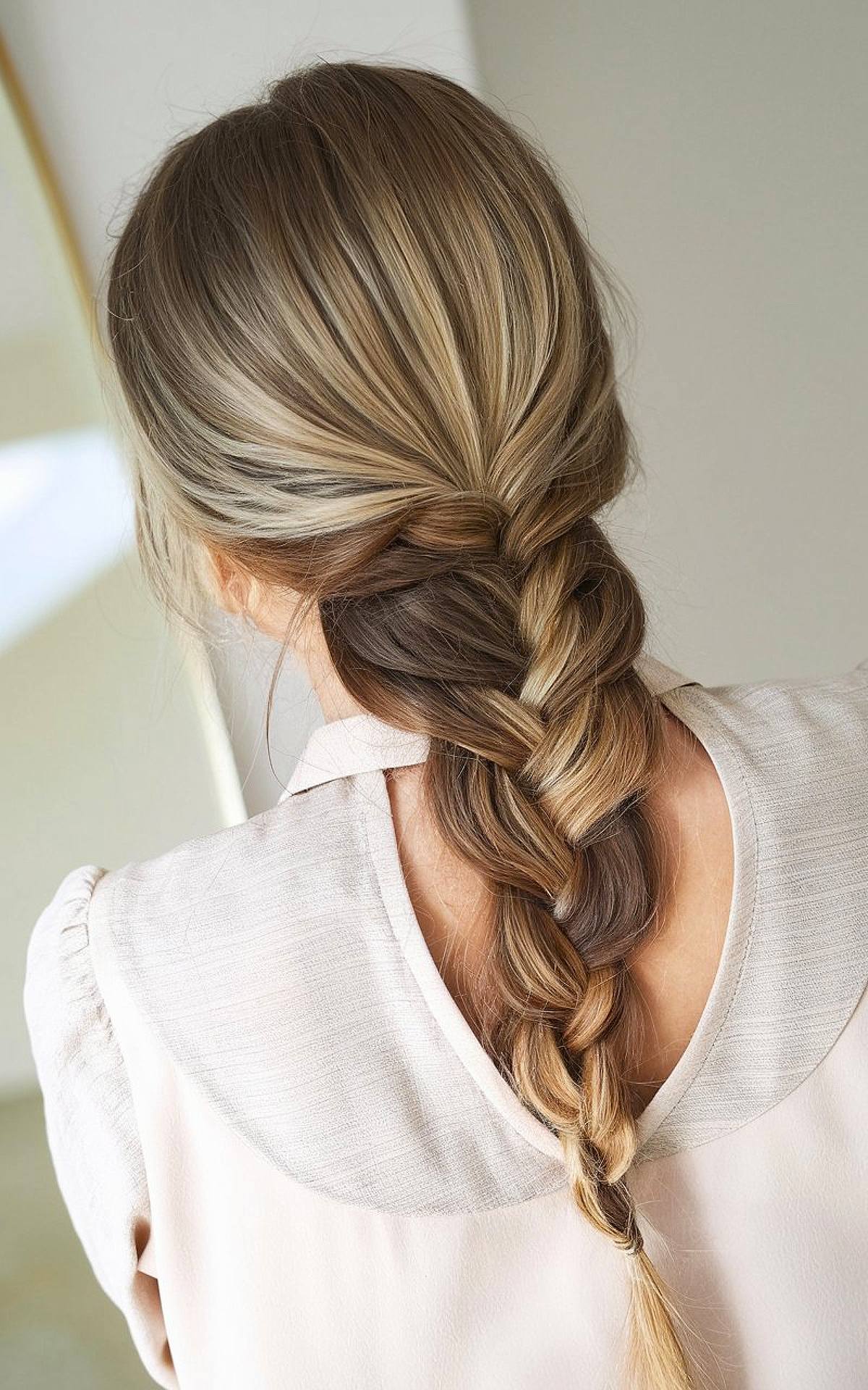 Work hairstyle for long thick hair with a loose braid