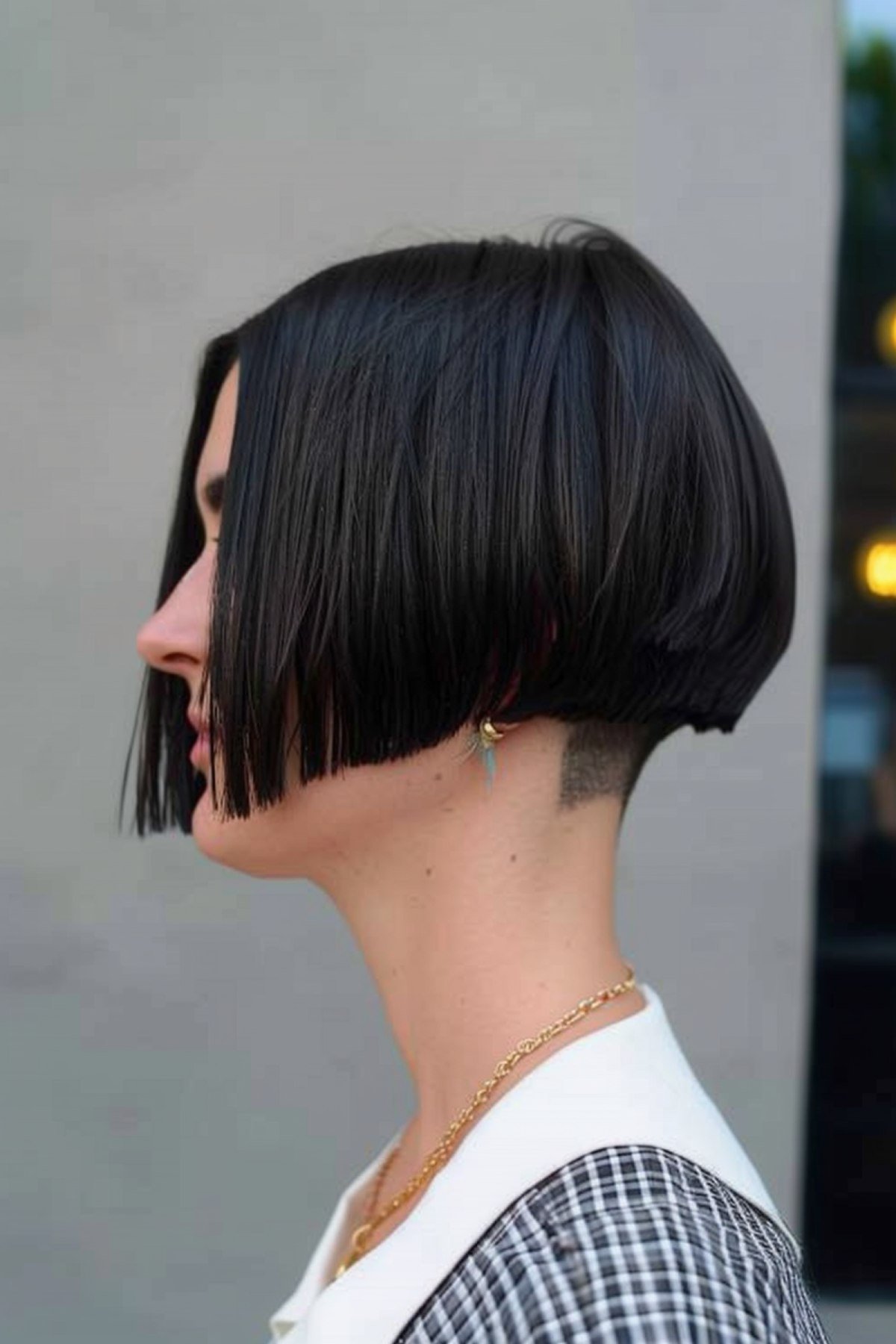 Short Bob Hairstyle with Clean Nape Undercut for Young Woman