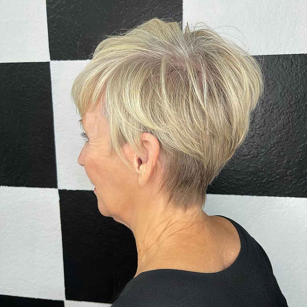 youthful pixie wedge haircut for women aged 60 plus
